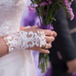 Beautiful wedding flower arrangement featuring roses, lilies, and greenery, designed for a romantic and elegant ceremony